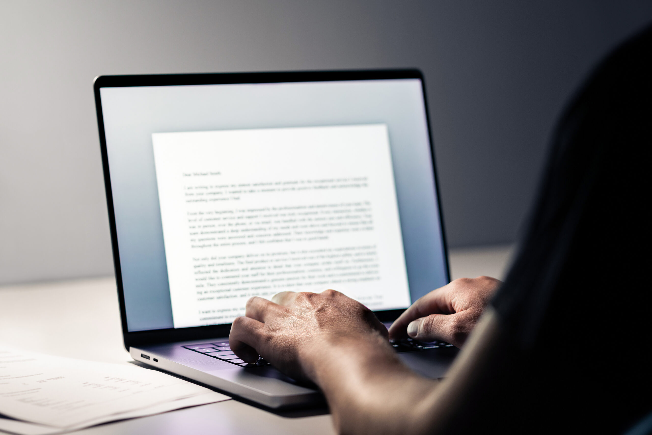 writing blog or content. writer with laptop computer. typing letter, article, book, college essay, text document or cv. business news report. journalist or editor working. student application.