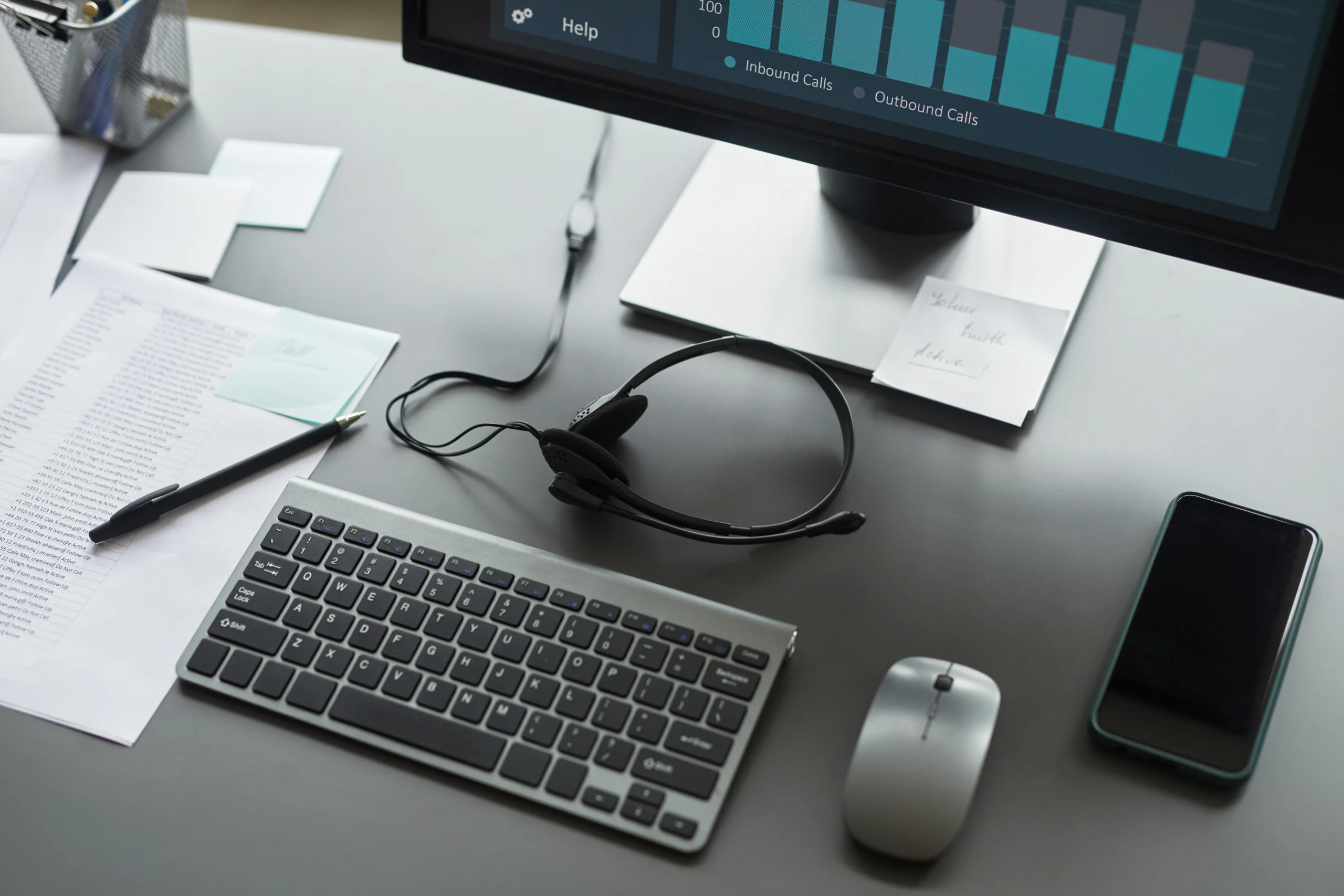closeup of office desk showing headset keyboard mo 2025 09 09 20 01 50 utc