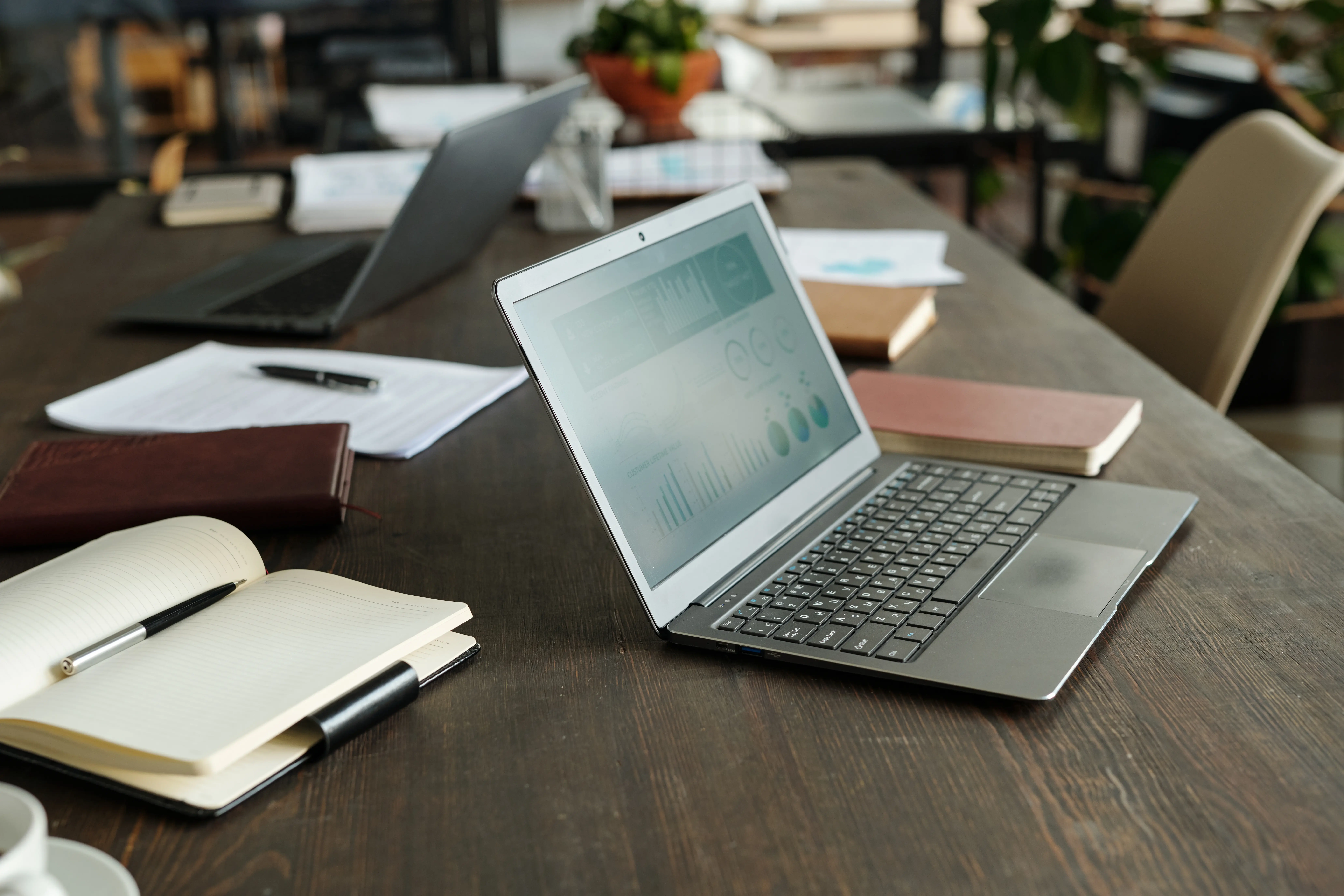 laptop displaying business analytics on table duri 2025 08 27 14 09 12 utc